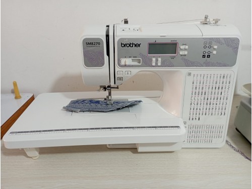 Maquina de brordar y coser